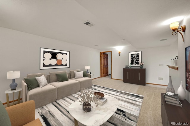 5722 W Chestnut Ave, Littleton, CO 80128 - living area featuring baseboards and light carpet