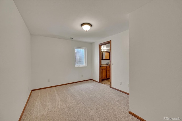 5722 W Chestnut Ave, Littleton, CO 80128 - unfurnished room featuring light colored carpet