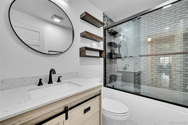 5722 W Chestnut Ave, Littleton, CO 80128 - full bath featuring vanity and bath / shower combo with glass door