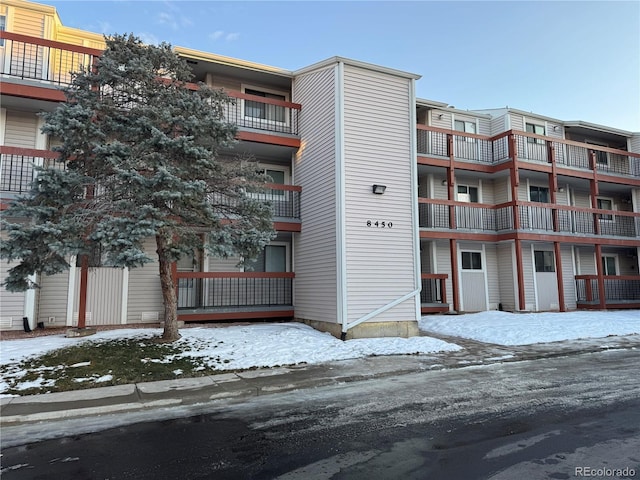 view of snow covered property