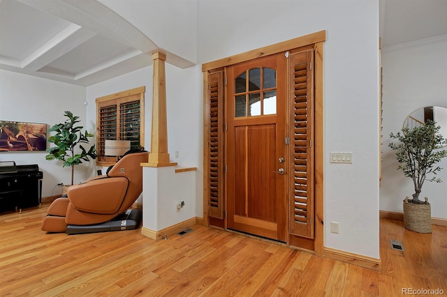 14370 Osage St, Westminster, CO 80023 - foyer featuring decorative columns, wood finished floors, baseboards, and beam ceiling