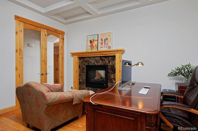 14370 Osage St, Westminster, CO 80023 - office area featuring coffered ceiling, beam ceiling, light wood-style flooring, and a high end fireplace