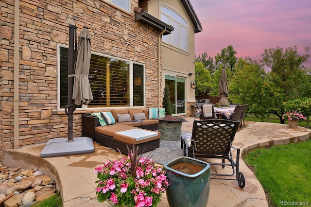 14370 Osage St, Westminster, CO 80023 - patio terrace at dusk featuring a patio area, an outdoor hangout area, a balcony, and a grill