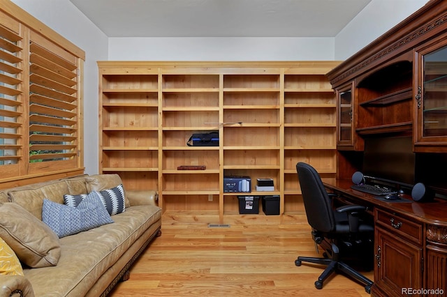 14370 Osage St, Westminster, CO 80023 - office space with light wood finished floors and built in study area
