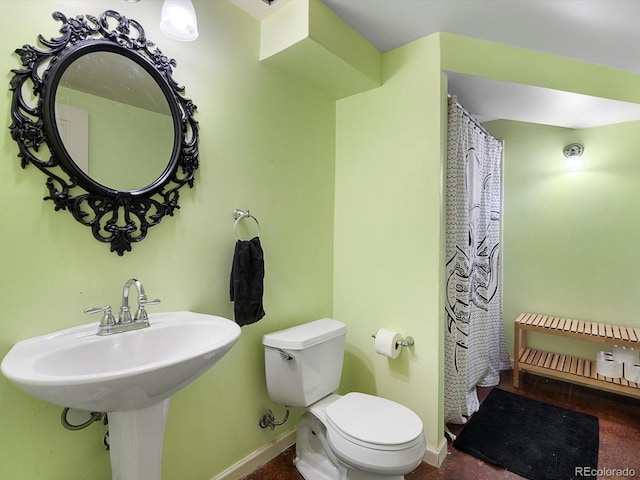 14050 E 25th Pl, Aurora, CO 80011 - bathroom featuring toilet and baseboards
