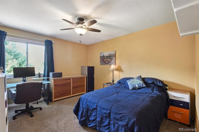 carpeted bedroom with a ceiling fan