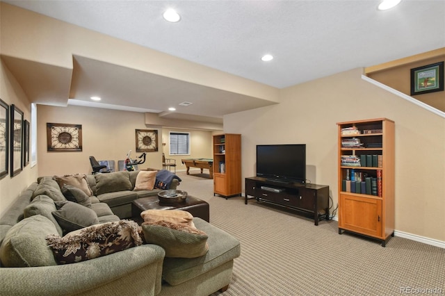 living area featuring light carpet, baseboards, and recessed lighting