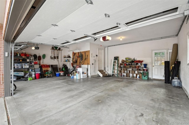 garage featuring a garage door opener