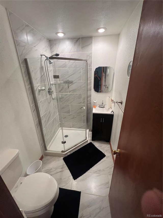 full bath with a stall shower, marble finish floors, toilet, baseboards, and recessed lighting