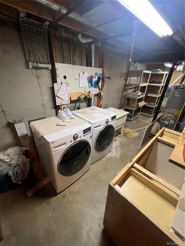 washroom with washing machine and clothes dryer