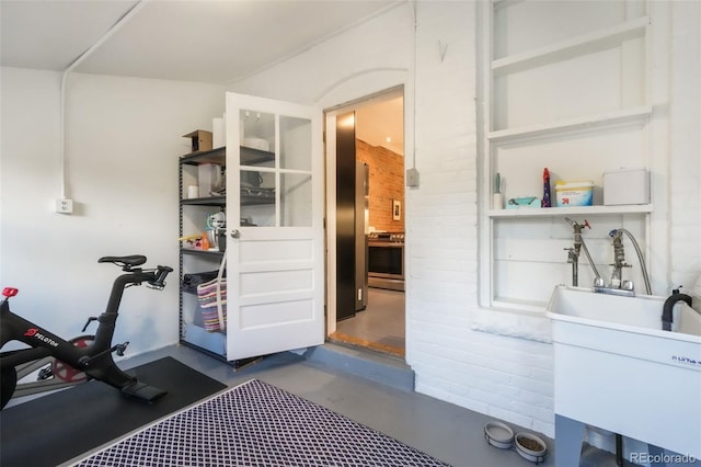 workout area with a sink