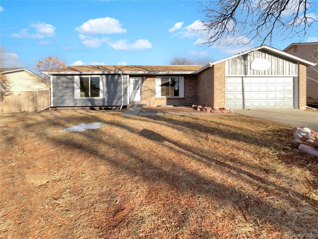 single story home featuring a garage