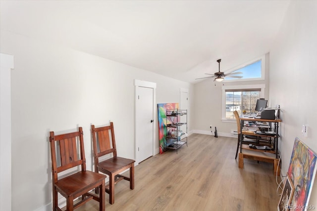 sitting room featuring lofted ceiling, light hardwood / wood-style floors, and ceiling fan