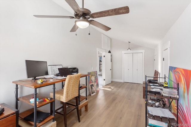 office area featuring lofted ceiling and light hardwood / wood-style flooring