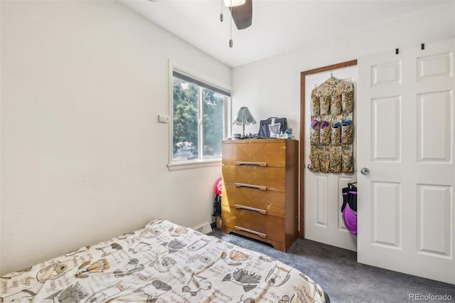 carpeted bedroom featuring ceiling fan