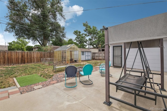 view of patio / terrace featuring an outdoor structure