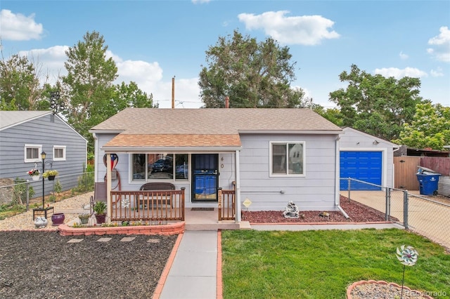 7940 Pontiac St, Commerce City, CO 80022 - view of front of property featuring a shingled roof, concrete driveway, fence private yard, a porch, and a garage