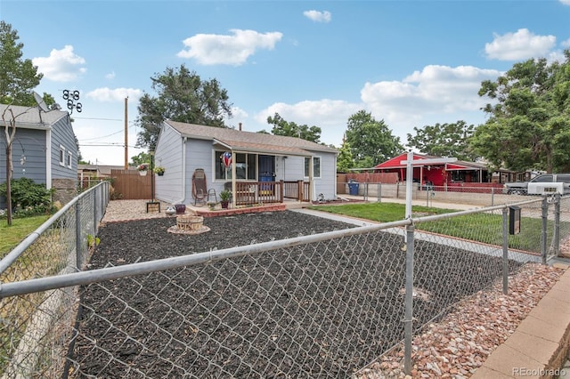 7940 Pontiac St, Commerce City, CO 80022 - bungalow featuring a porch and a fenced front yard