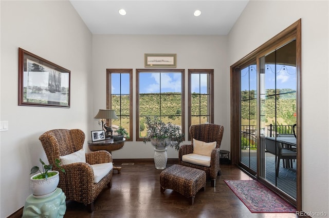 8000 Raphael Ln, Littleton, CO 80125 - sitting room with wood finished floors and recessed lighting