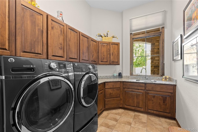 8000 Raphael Ln, Littleton, CO 80125 - washroom featuring cabinet space and washer and clothes dryer