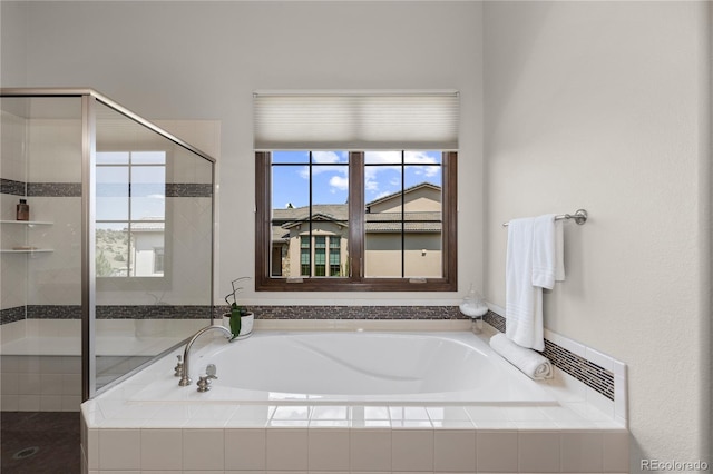 8000 Raphael Ln, Littleton, CO 80125 - full bathroom featuring a shower stall and a bath