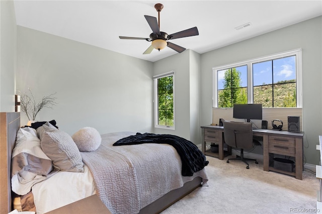 8000 Raphael Ln, Littleton, CO 80125 - bedroom with an office area, light colored carpet, and a ceiling fan