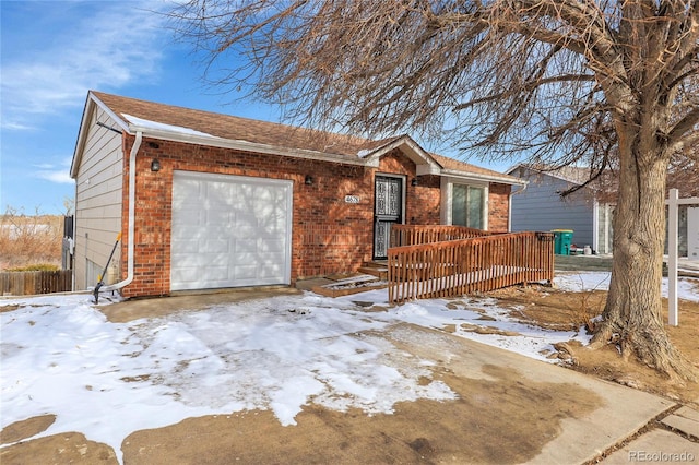 ranch-style home with brick siding and an attached garage