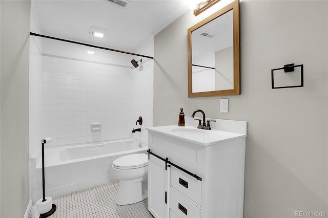 bathroom featuring shower / bathtub combination, toilet, visible vents, vanity, and tile patterned floors