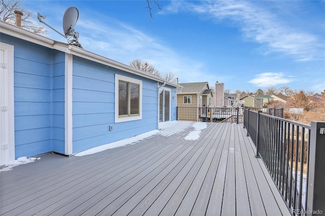 wooden deck featuring a residential view