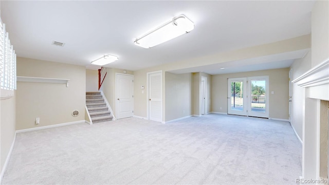 9629 Yukon Ct, Westminster, CO 80021 - basement featuring stairway and light colored carpet