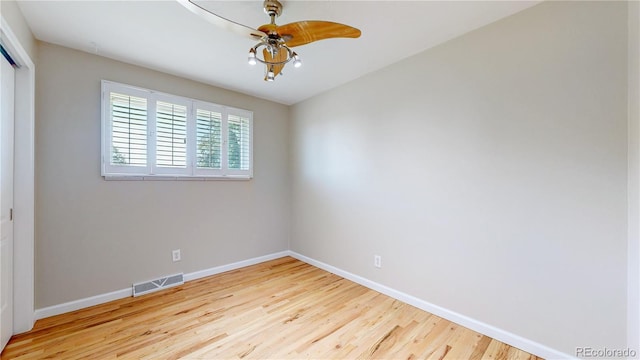 9629 Yukon Ct, Westminster, CO 80021 - unfurnished room with wood finished floors and a chandelier