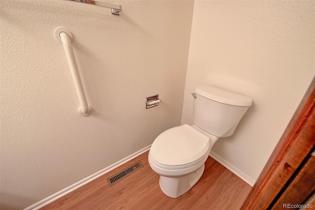 2713 W Long Dr Unit C, Littleton, CO 80120 - bathroom with wood finished floors and toilet