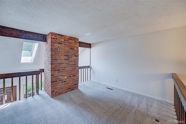 2713 W Long Dr Unit C, Littleton, CO 80120 - carpeted spare room with a skylight and a textured ceiling