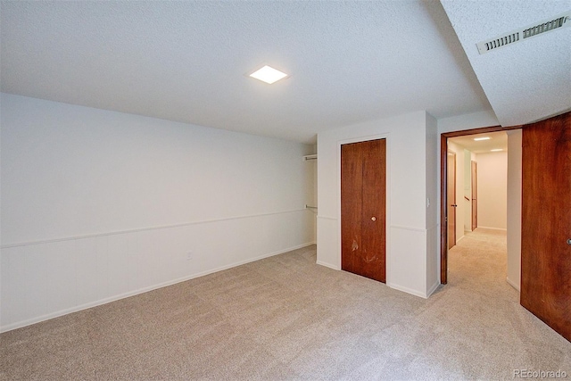 2713 W Long Dr Unit C, Littleton, CO 80120 - unfurnished bedroom featuring carpet and a closet