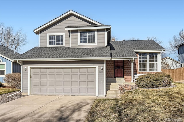 front of property featuring a garage and a front yard