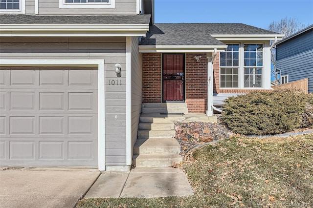 entrance to property featuring a garage