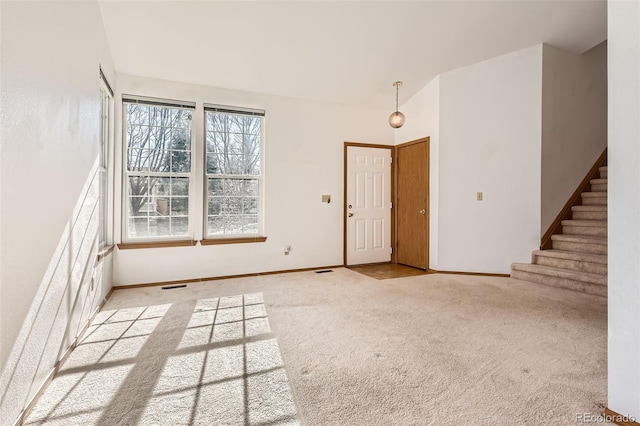 empty room featuring light colored carpet