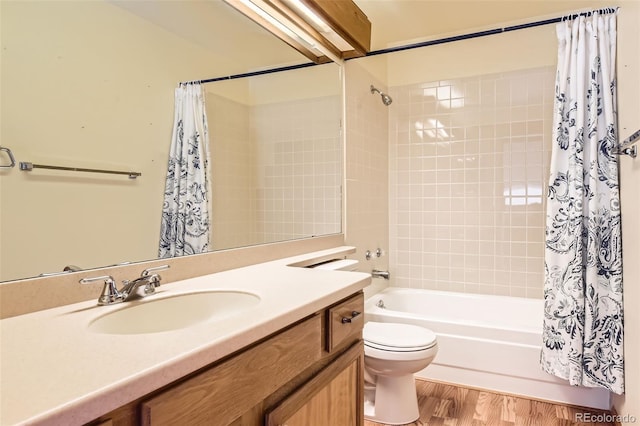 full bathroom with vanity, wood-type flooring, toilet, and shower / bath combo with shower curtain