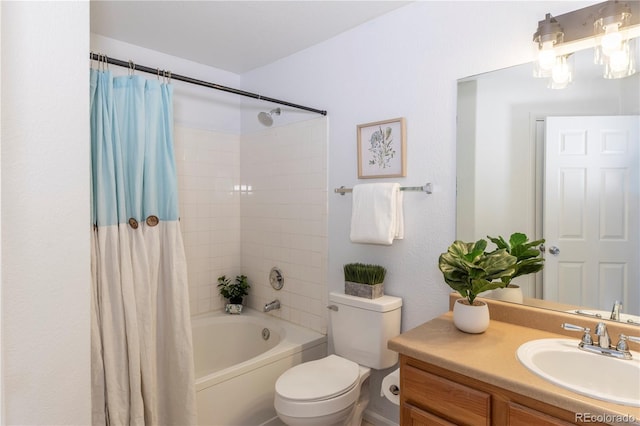 full bath with vanity, toilet, and shower / bath combo with shower curtain