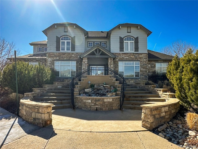 view of front of house featuring stone siding