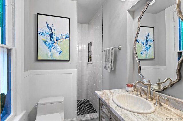 848 S Emerson St, Denver, CO 80209 - bathroom featuring vanity, a tile shower, and toilet