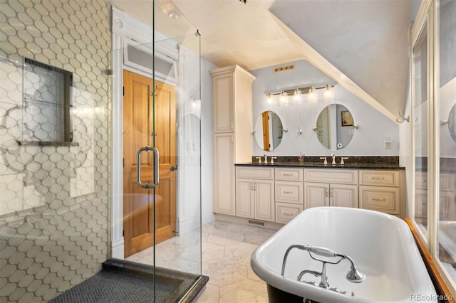 848 S Emerson St, Denver, CO 80209 - bathroom with a freestanding tub, double vanity, and a shower stall