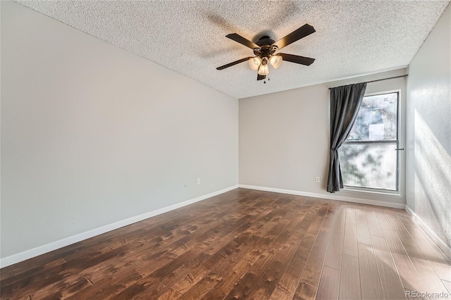 empty room with wood-type flooring, plenty of natural light, ceiling fan, and a textured ceiling