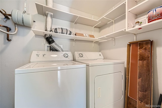 laundry room with washer and dryer