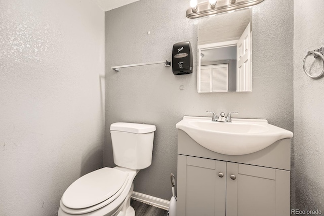 16623 E Asbury Pl, Aurora, CO 80013 - half bath featuring vanity and wood finished floors