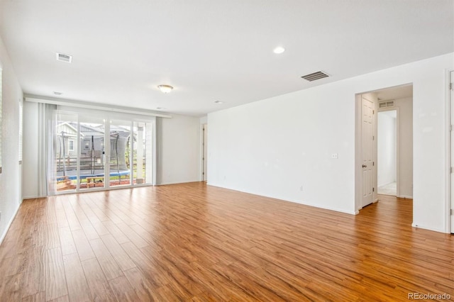 9674 Truckee St, Commerce City, CO 80022 - spare room featuring light wood-style floors and visible vents