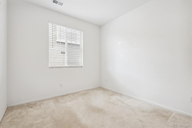 9674 Truckee St, Commerce City, CO 80022 - unfurnished room with light carpet, baseboards, and visible vents
