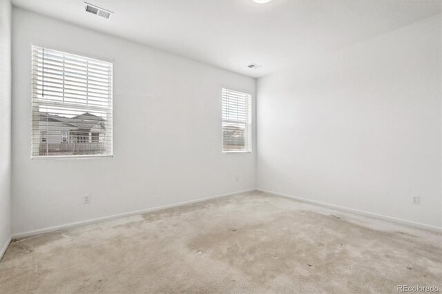 9674 Truckee St, Commerce City, CO 80022 - carpeted empty room featuring baseboards and visible vents