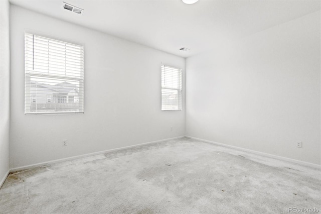 9674 Truckee St, Commerce City, CO 80022 - carpeted empty room with visible vents and baseboards