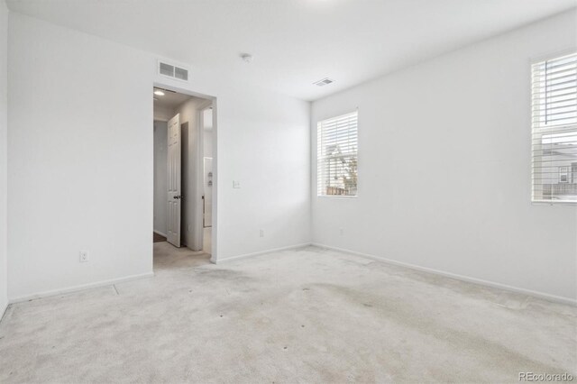 9674 Truckee St, Commerce City, CO 80022 - carpeted spare room with baseboards and visible vents
